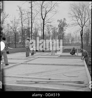 Rohwer Relocation Center, McGehee, Arkansas. Volunteer workers are here constructing apartments for . . . - - 538899 Stock Photo