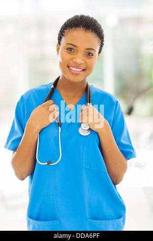 beautiful young African female nurse in office Stock Photo