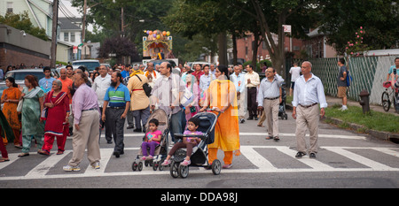 Hundreds of members of the Hindu Center march through the Flushing neighborhood in the New York