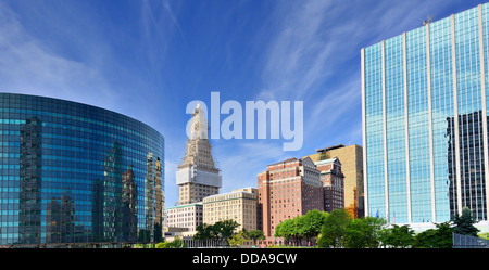 The skyline of downtown Hartford, Connecticut at dusk from across the Connecticut River. Stock Photo