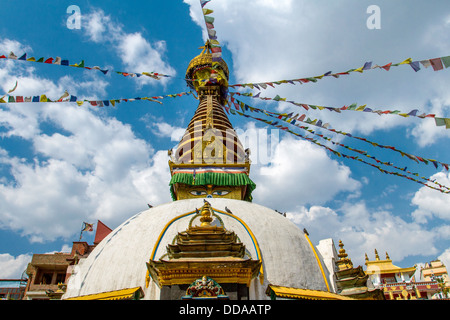 Kathesimbu Stupa with Buddha wisdom eyes and prayer colorful flags in Kathmandu, Nepal Stock Photo