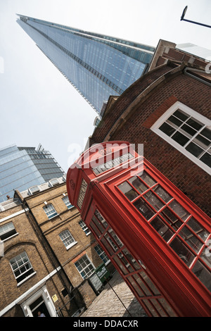 Red phone box and the Shard diagonal composition. Stock Photo