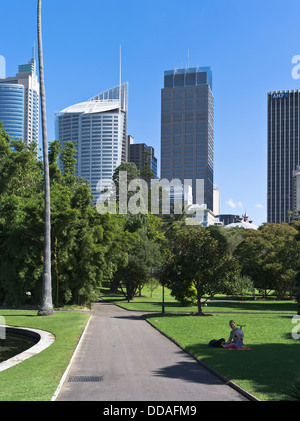 dh Royal  Botanic Gardens SYDNEY AUSTRALIA Woman child Central Business District city skyline buildings garden Stock Photo