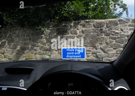 Have you paid and displayed sign viewed from inside a car England uk Stock Photo