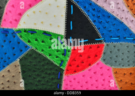 Bright background of the leather pieces and ropes. Stock Photo