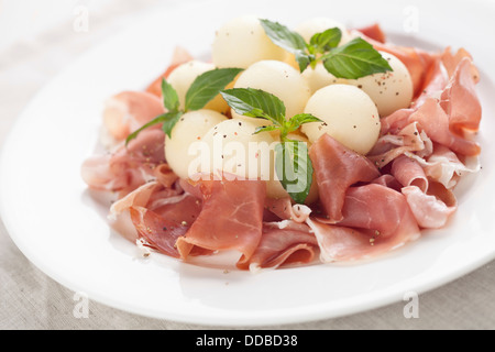 Melon with parma ham Stock Photo