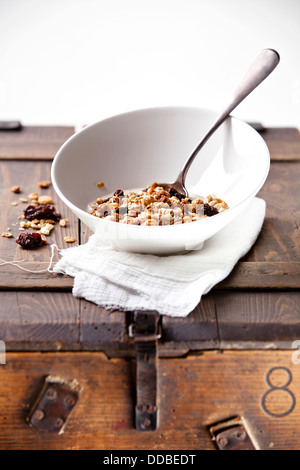 Healthy breakfast with muesli on textured background Stock Photo