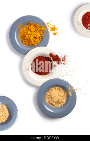Top view on plates with mix of spices isolated Stock Photo