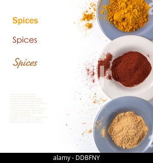 Top view on plates with mix of spices isolated with sample text Stock Photo