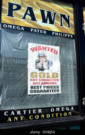 A poster in a Glasgow pawn shop window Scotland UK Stock Photo