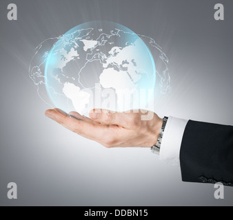 hand holding virtual sphere globe Stock Photo