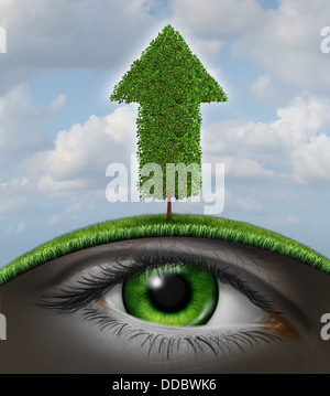 Growth vision business concept as a tree in the shape of an upward arrow and a human eye underground growing in the roots as a symbol of investment success with seed money for new financial ventures. Stock Photo