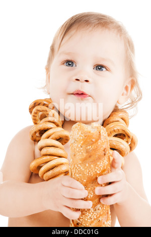 cute todler eating long bread Stock Photo