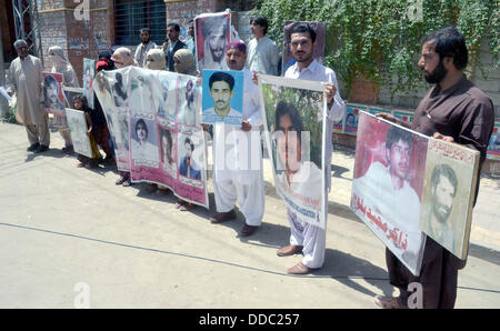 Pakistan. 30th Aug, 2013. Relatives of missing persons are protesting against missing and kidnapping of their beloved and demanding for their release on the occasion of universal day for missing persons during a demonstration arranged by Voice for Baloch Missing Persons at Quetta press club on Friday, August 30, 2013 Credit:  Asianet-Pakistan/Alamy Live News