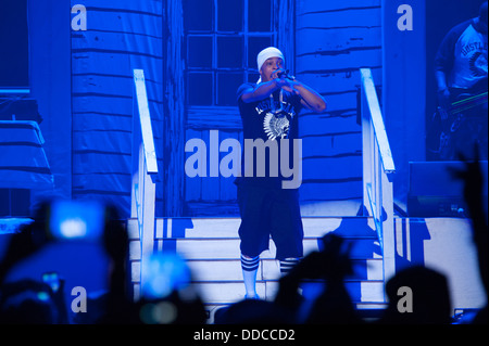 SACRAMENTO, CA - AUGUST 28: Rapper Clifford Joseph Harris, Jr. aka T.I. performs in concert as part of America's Most Wanted Tour at Sleep Train Arena on August 28, 2013 in Sacramento, California. Stock Photo