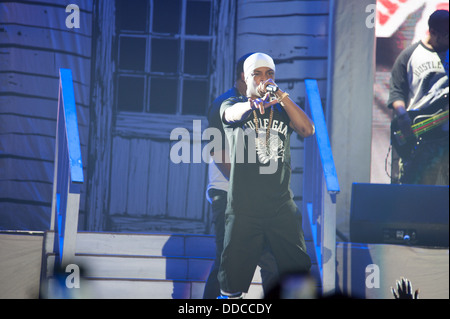 SACRAMENTO, CA - AUGUST 28: Rapper Clifford Joseph Harris, Jr. aka T.I. performs in concert as part of America's Most Wanted Tour at Sleep Train Arena on August 28, 2013 in Sacramento, California. Stock Photo