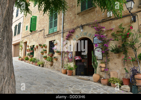 Typical Mediterranean Village with Flower Pots in Facades in Valldemossa, Mallorca, Spain ( Balearic Islands ) Stock Photo