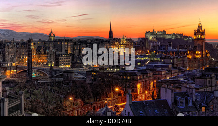 View over Edinburgh city Calton Hill at sunset showing buildings, castle, bridges and churches etc, Scotland Stock Photo