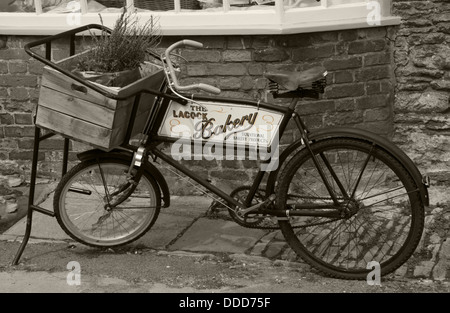 The Lacock Bakery delivery bike, Lacock village, Wiltshire, England, UK Stock Photo