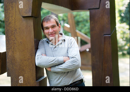 The Berlin sculptor Volker Bartsch stands in an exhibition taking place on occasion of his 60th anniversary in the Georg-Kolbe-Museum in Berlin, Germany, 30 August 2013. Photo: MAURIZIO GAMBARINI Stock Photo