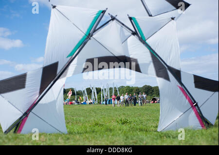 Bristol, UK. 31st Aug, 2013. The Decorators, a kite flying group based in London, fly a choreographed performance at Bristol International Kite Festival 2013    Bristol International Kite Festival is considered as one of the biggest kite festivals in Europe.  31/8/13 Credit:  Andrew Walmsley/Alamy Live News Stock Photo