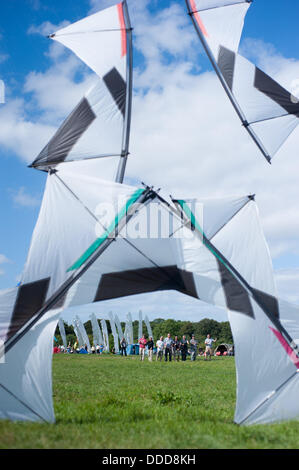 Bristol, UK. 31st Aug, 2013. The Decorators, a kite flying group based in London, fly a choreographed performance at Bristol International Kite Festival 2013    Bristol International Kite Festival is considered as one of the biggest kite festivals in Europe.  31/8/13 Credit:  Andrew Walmsley/Alamy Live News Stock Photo