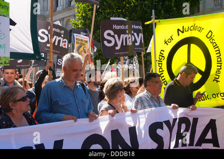 London, UK. 31st Aug, 2013.  Demonstrators on Whitehall as thousands march against US and other western countries using military intervention in the Syrian conflict following 'red line' chemical attacks on civilians. Credit:  Paul Davey/Alamy Live News Stock Photo