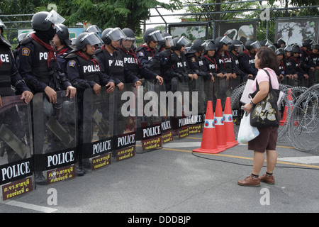 Riot policeman standing guard near Parliament of Thailand Stock Photo