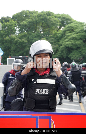 Riot policeman standing guard near Parliament of Thailand Stock Photo