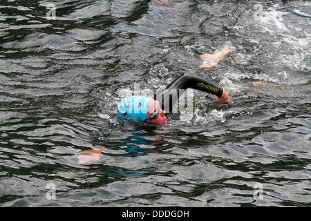 Copenhagen, Denmark. 31st Aug, 2013. 2,400 swim round the Parliament building, the Christiansborg Castle or Palace in central Copenhagen in the 2,000 m largest annual open water competition in Denmark, the Copenhagen Swim, organised by the Danish Swimming Federation and the newspaper Politiken. Credit:  Niels Quist/Alamy Live News Stock Photo