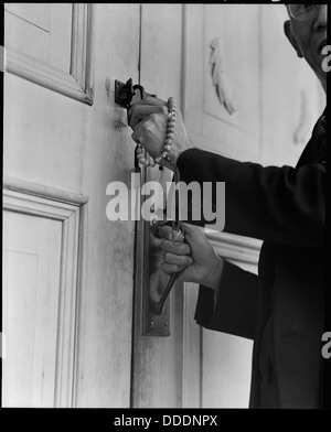 Florin, California. Hands of Reverend Naito (Buddhist priest) are here as he locks the door of his . . . 537853 Stock Photo