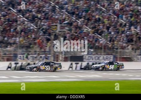 Aug. 31, 2013 - Hampton, GA, U.S. - Bristol, TN - AUG 31, 2013: Kevin Harvick (33) wins the GREAT CLIPS - GRIT CHIPS 300 at Atlanta Motor Speedway in Hampton, GA. Stock Photo