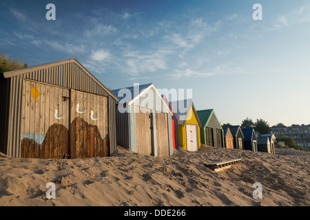 Abersoch beach huts at sunrise dawn Llŷn Peninsula Gwynedd North Wales UK Stock Photo