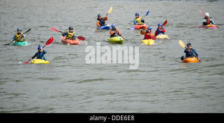 Aberystwyth Wales UK, Sunday 1 Sept 2013. A group of 11 women, aged from 20 to 62, all members of Aber Kayakers (Aberystwyth Kayaking Club) setting off on a 10km ocean kayak trip from the harbour at Aberystwyth, to Borth, to raise money for the RNLI. Credit:  keith morris/Alamy Live News Stock Photo