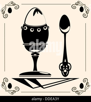 on beige background is black vintage egg with spoon Stock Photo