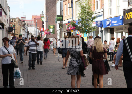 A busy pedestrianized town centre of Maidstone, Kent. Stock Photo