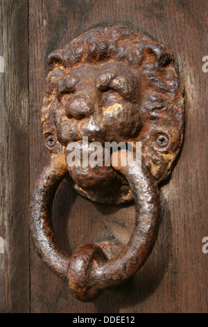 Metal, old, door knocker in the shape of a lion's head Stock Photo