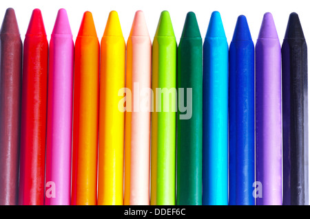 Colorful wax crayons and pencils isolated on white background. Copy ...