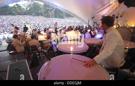 Derby, UK. 1st Sept, 2013.James Holmes conducts Sinfonia Viva orchestra at the Darley Park Concert.   Presented by Derby LIVE in partnership with the East Midlands Sinfonia Viva orchestra, Classic FM and Rolls Royce, The Darley Park Concert is one of the UK's biggest outdoor classical concerts. © Matthew Taylor/Alamy Live News Stock Photo