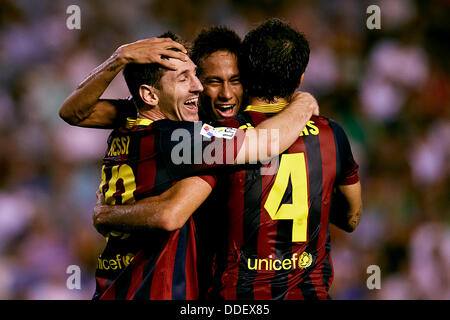 Valencia, Spain. 01st Sep, 2013. Forward Lionel Messi of FC Barcelona (L) celebrates with Forward Neymar of FC Barcelona (C) and Midfielder Cesc Fabregas of FC Barcelona after scoring his third goal during the Spanish La Liga game between Valencia and Barcelona from the Mestalla Stadium. Credit:  Action Plus Sports/Alamy Live News Stock Photo