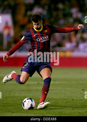 Valencia, Spain. 01st Sep, 2013. Defender Gerard Pique of FC Barcelona strikes during the Spanish La Liga game between Valencia and Barcelona from the Mestalla Stadium. Credit:  Action Plus Sports/Alamy Live News Stock Photo