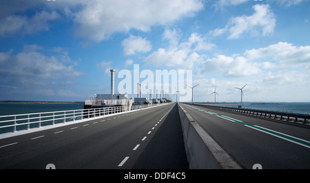 Cycle-track and highway on the flood barrier, Pijlerdam, a part of the Delta works, Zeeland, Netherlands Stock Photo