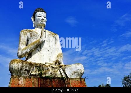 Giant Buddha statue at Wat Ek Phnom temple near the city of Battambang, Cambodia. Stock Photo