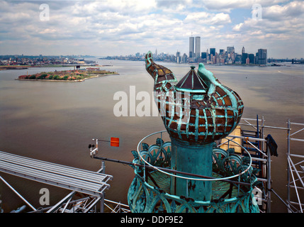 View of the torch platform of the Statue of Liberty looking east at New York harbor, Ellis Island and Lower Manhattan during restoration in 1984 on Liberty Island, NY. The restoration was undertaken for the centennial anniversary. Stock Photo