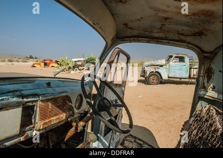 View from inside a car wreck at Solitaire, Khomas region, Namibia Stock Photo