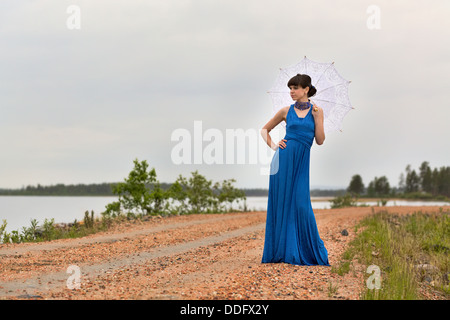 Beautiful dark haired model strolling through the woods. Fairy Tale setting. Stock Photo