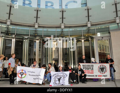 London, UK. 2nd Sep, 2013. Members of the protest group, Disabled People Against the Cuts (DPAC) block the entrance to the BBC. The protest is to highlight what they claim is a lack of coverage of the consequences of government cuts on disabled people in on BBC News programming. Credit:  Pete Maclaine/Alamy Live News Stock Photo