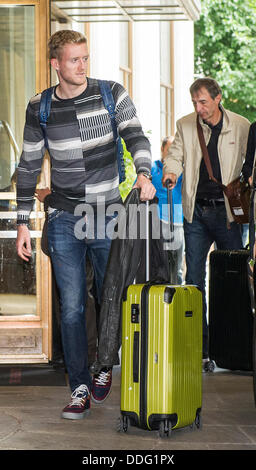 Munich, Germany. 02nd Sep, 2013. German national soccer player Andre Schuerrle arrives at the team hotel in Munich, Germany, 02 September 2013. Germany will play Austria in a World Cup qualifier in Munich on 06 September 2013. Photo: MARC MUELLER/dpa/Alamy Live News Stock Photo