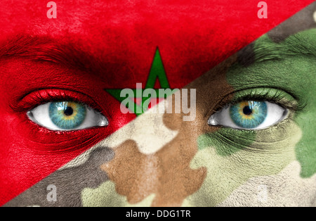 Human face painted with flag of Morocco Stock Photo by ©Alexis84 41773657