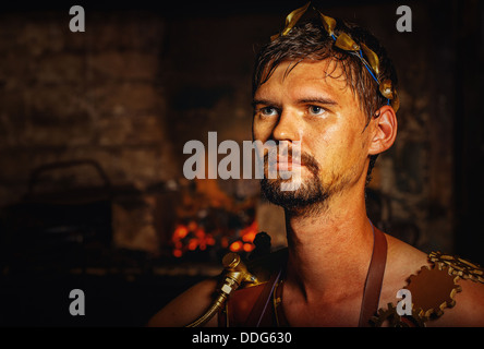 Hephaestus blacksmith in a leather apron, a large portrait of the forge Stock Photo